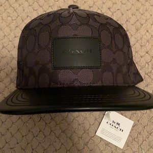 Black Coach leather brim hat